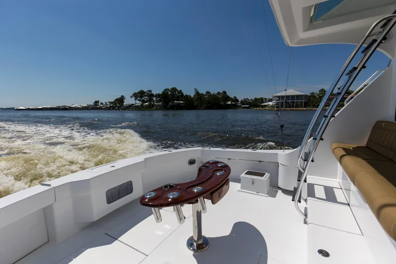Lady A Yacht Photos Pics 2008 Hatteras 54 Convertible yacht deck with ocean view and seating area.