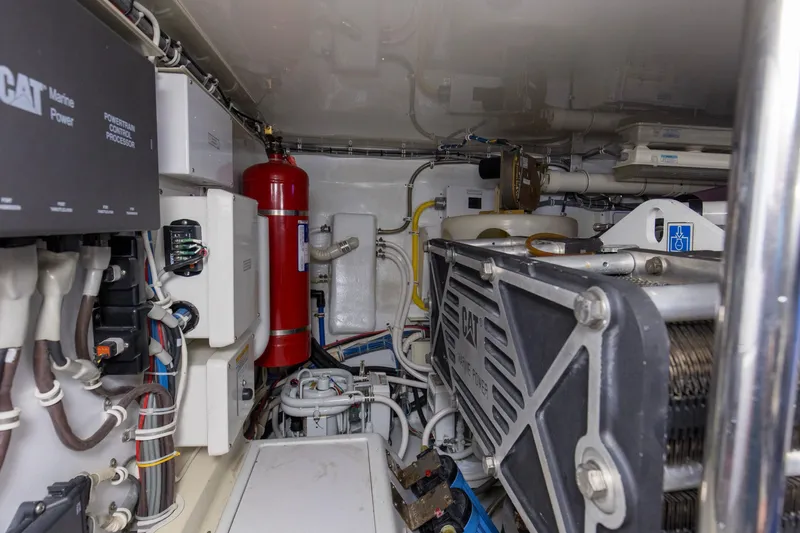 Lady A Yacht Photos Pics Engine room of 2008 Hatteras 54 Convertible yacht with CAT Marine Power equipment.