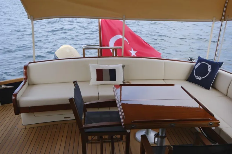  Yacht Photos Pics Luxurious 2009 Vicem Classic 71 yacht deck with elegant seating and Turkish flag.
