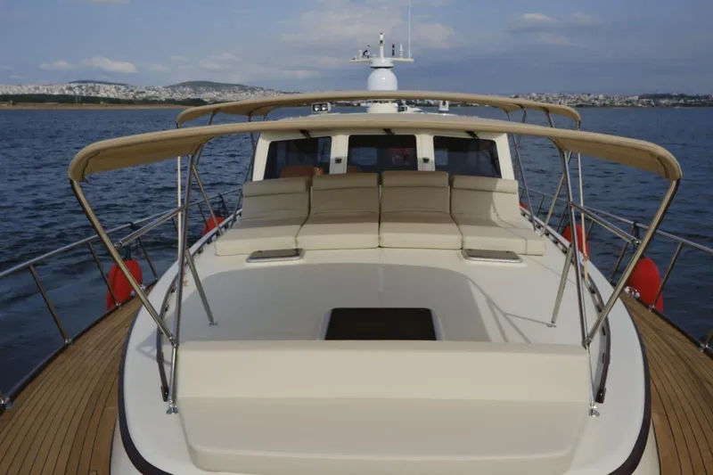  Yacht Photos Pics 2009 Vicem Classic 71 yacht with sun deck and canopy on calm waters.