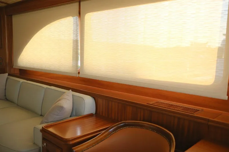  Yacht Photos Pics Interior of 2009 Vicem Classic 71 yacht with elegant wood and soft furnishings.