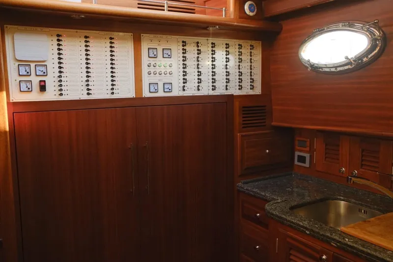  Yacht Photos Pics Vicem Classic 71 yacht interior, 2009 model, featuring control panels and a wooden finish.