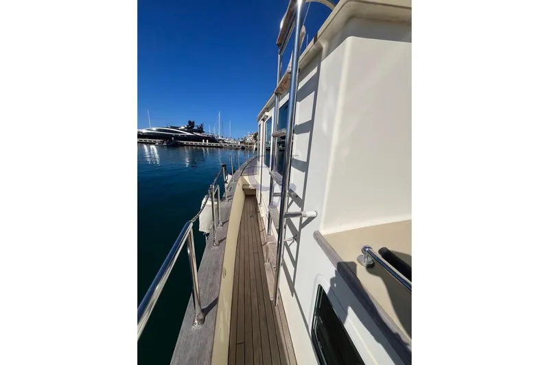 Yacht Photos Pics Side view of Sibma Navale Italiana Armstrong 12 yacht, 2012, docked in a marina.