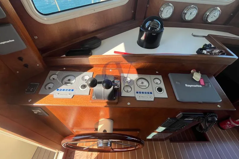  Yacht Photos Pics Control panel of a 2012 Sibma Navale Italiana Armstrong 12 boat with navigation instruments.