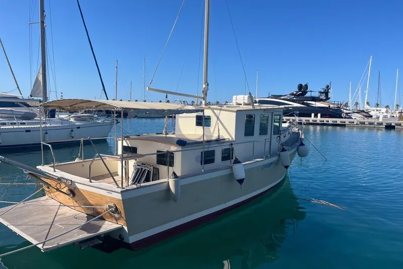  Yacht Photos Pics Sibma Navale Italiana Armstrong 12 boat, 2012 model, docked in a marina.