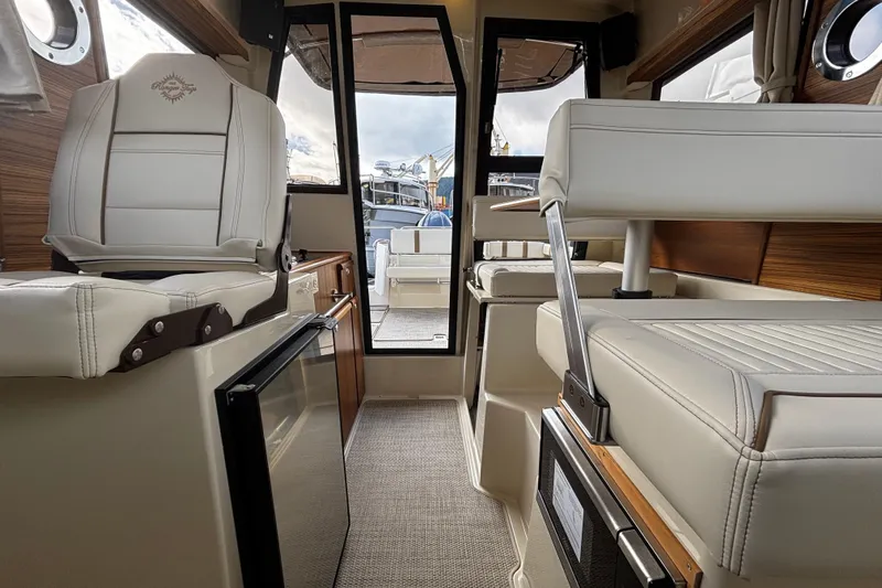  Yacht Photos Pics Interior of 2026 Ranger Tugs R-23 boat, featuring luxurious seating and modern design.
