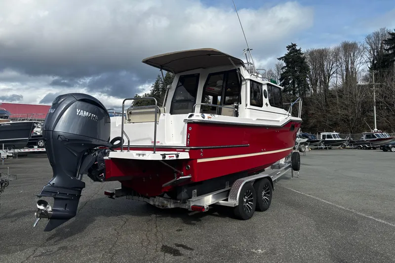  Yacht Photos Pics 2026 Ranger Tugs R-23 boat with Yamaha outboard motor on trailer.