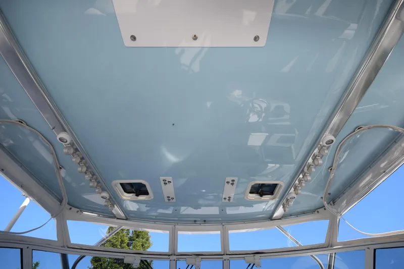  Yacht Photos Pics 2009 Jupiter 39 Express boat ceiling with blue finish and mounted lights.