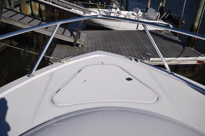  Yacht Photos Pics Bow view of 2009 Jupiter 39 Express boat docked at marina.