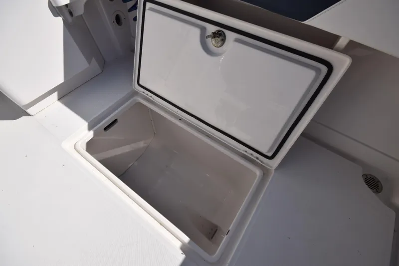  Yacht Photos Pics Open storage compartment on 2009 Jupiter 39 Express boat, showcasing interior space.