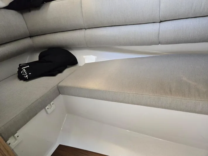 Love You More Yacht Photos Pics Interior seating of 2019 Four Winns H350 boat with gray upholstery.
