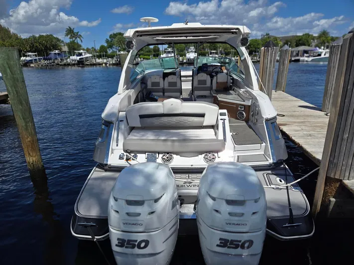 Love You More Yacht Photos Pics 2019 Four Winns H350 boat docked with twin 350 engines, clear skies.