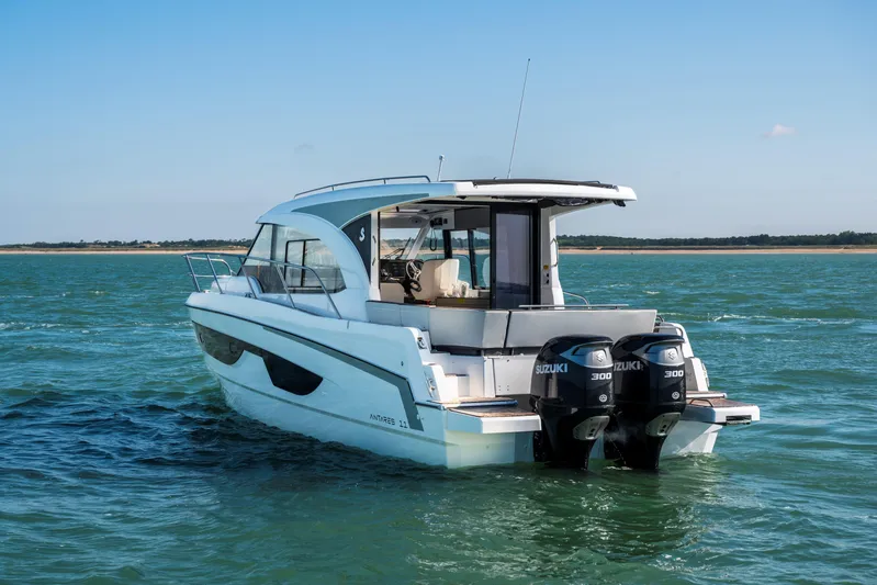  Yacht Photos Pics 2026 Beneteau Antares 11 Coupe boat with dual Suzuki engines on open water.