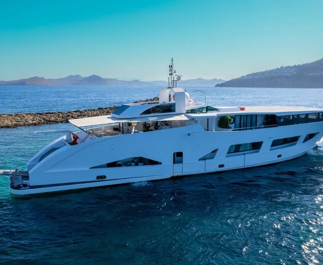  Yacht Photos Pics Luxurious Custom 42 yacht cruising in clear blue waters, 1983 model.