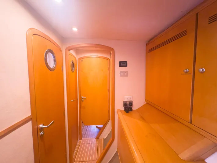 Leilani Yacht Photos Pics Luxurious yacht interior with wooden doors and cabinets, 2005 custom model.