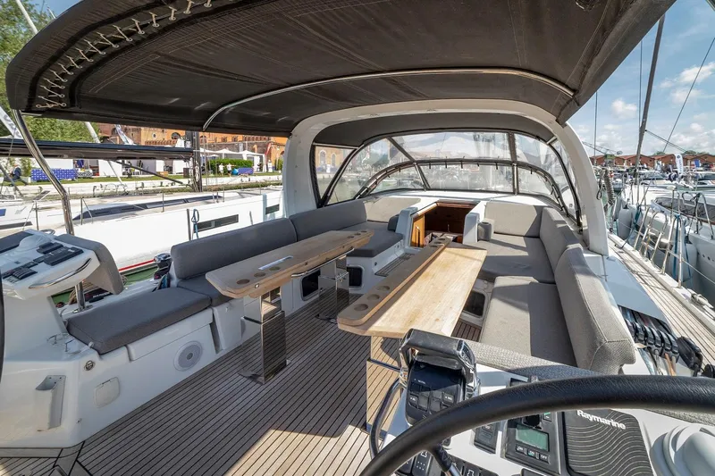  Yacht Photos Pics Luxurious Jeanneau Yacht 60 cockpit, 2022 model, featuring spacious seating and modern design.