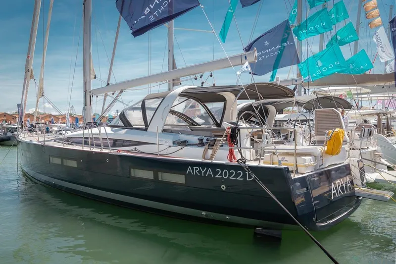  Yacht Photos Pics 2022 Jeanneau Yacht 60 docked at marina, showcasing sleek design and modern features.