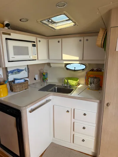 Big Time Yacht Photos Pics 1996 Tiara Yachts 3500 Express kitchen area.