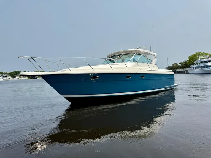 Big Time Yacht Photos Pics 1996 Tiara Yachts 3500 Express on calm water.