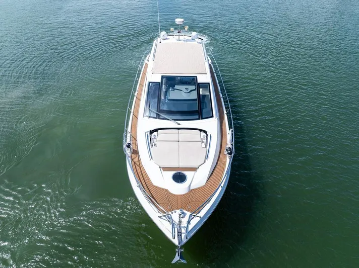 Minion Yacht Photos Pics 2014 Cranchi 56 HT yacht on calm water, aerial view.
