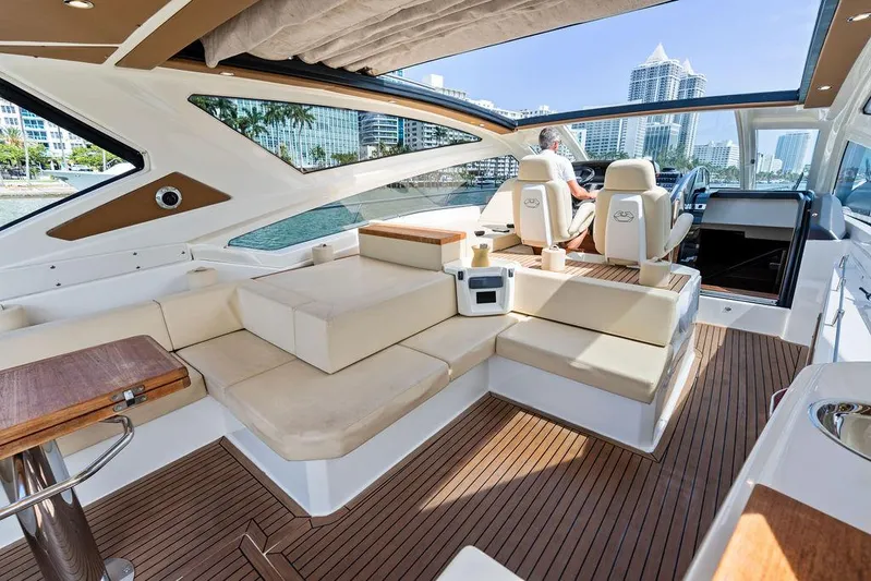 Minion Yacht Photos Pics Luxurious 2014 Cranchi 56 HT yacht interior with plush seating and modern design.