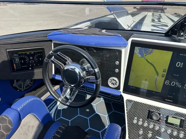  Yacht Photos Pics Cockpit of 2018 Wright Performance 420 boat with steering wheel and navigation display.