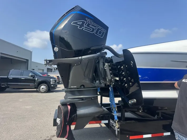  Yacht Photos Pics 2018 Wright Performance 420 boat with powerful outboard engine, parked near a black truck.