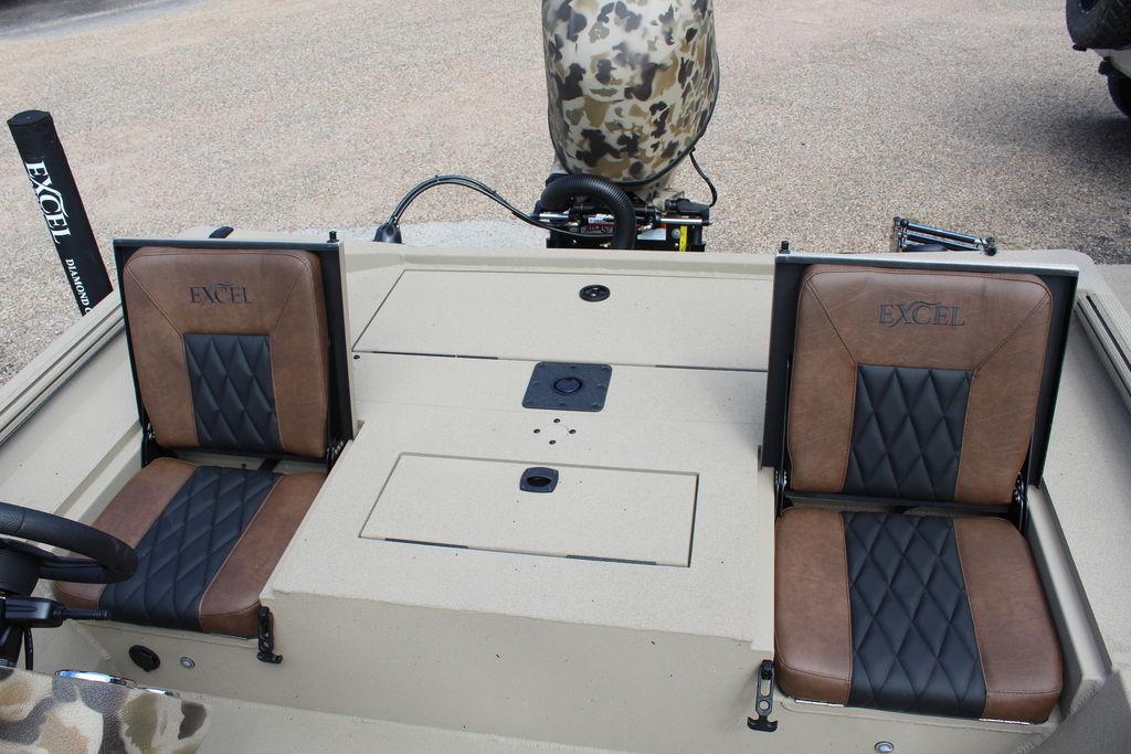 2026 Excel Bolt 183 boat interior with brown and black leather seats.