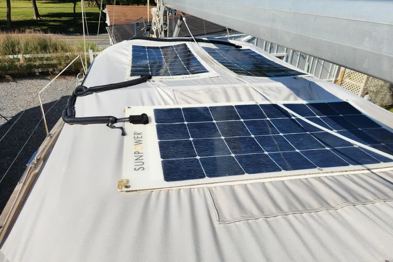 Glendora Yacht Photos Pics Solar panels on a 2007 Hallberg-Rassy 37 sailboat, harnessing renewable energy.