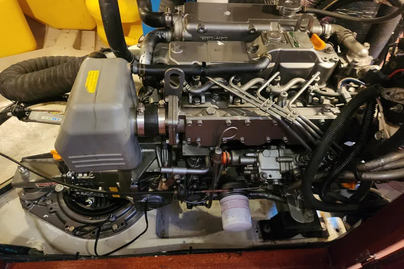 Glendora Yacht Photos Pics Engine of a 2007 Hallberg-Rassy 37 sailboat, showcasing intricate mechanical components.