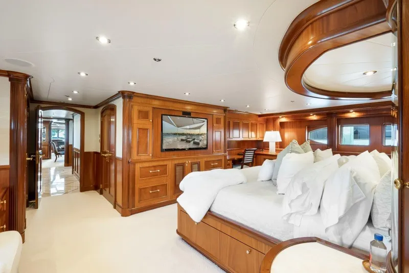 Miss Stephanie Yacht Photos Pics Luxurious Richmond Yachts 2004 interior with elegant wood paneling and plush bedding.