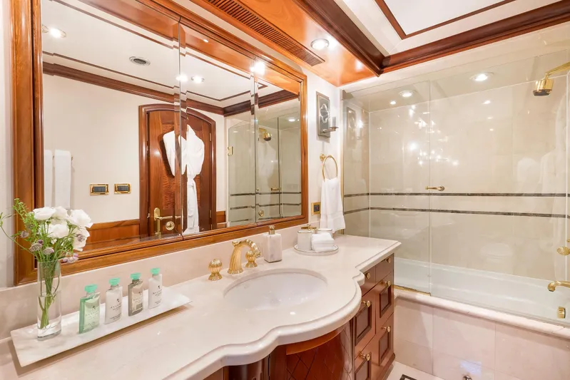 Miss Stephanie Yacht Photos Pics Luxurious yacht bathroom with elegant wood accents and marble countertop, Richmond Yachts 2004 model.