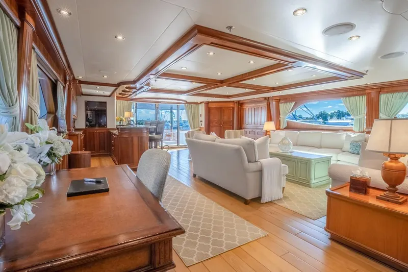Miss Stephanie Yacht Photos Pics Luxurious interior of 2004 Richmond Yachts Semi-Displacement, featuring elegant woodwork and plush seating.