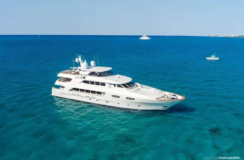 Miss Stephanie Yacht Photos Pics Luxurious 2004 Richmond Yachts semi-displacement yacht cruising in clear blue waters.