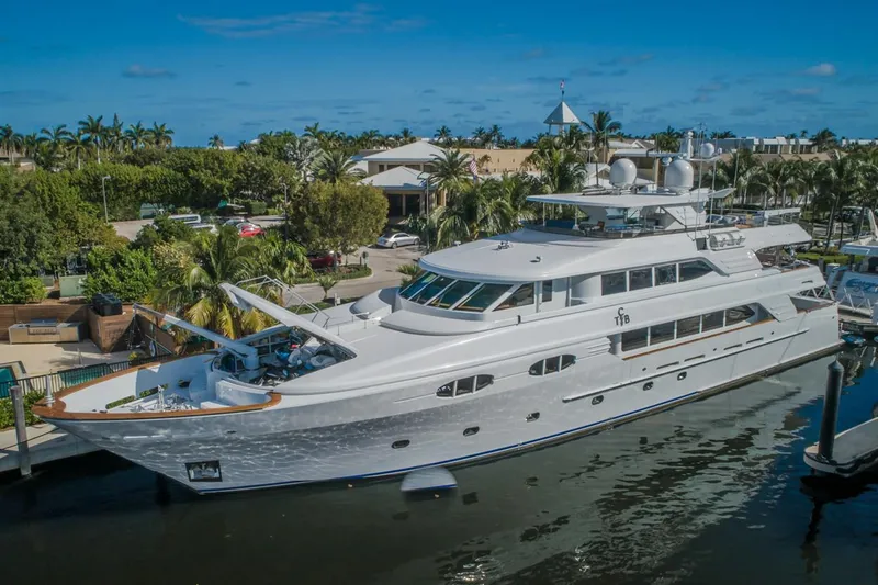 Miss Stephanie Yacht Photos Pics Luxurious 2004 Richmond Yachts semi-displacement yacht docked in a tropical marina.