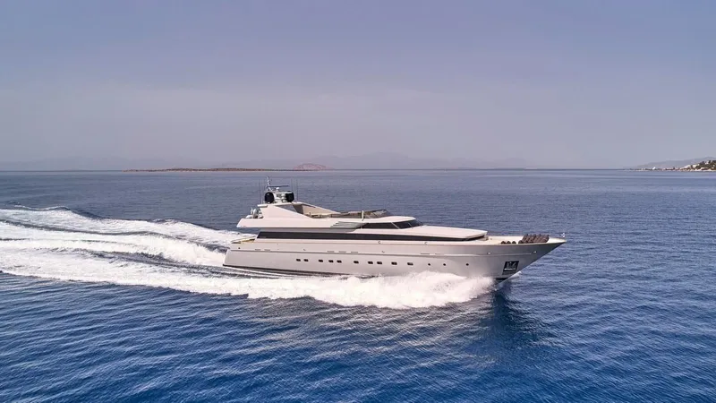 Kintaro Yacht Photos Pics Luxury yacht Cantieri di Pisa Akhir 38 cruising on open sea, 2005 model.