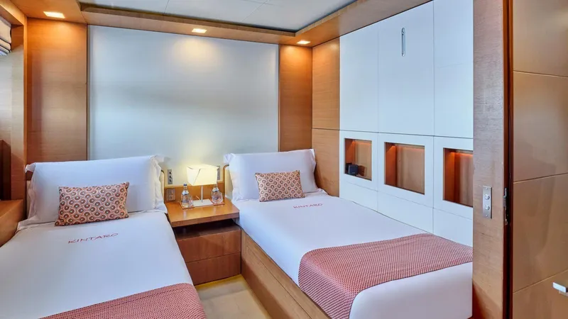 Kintaro Yacht Photos Pics Luxurious twin cabin interior on 2005 Cantieri di Pisa Akhir 38 yacht.