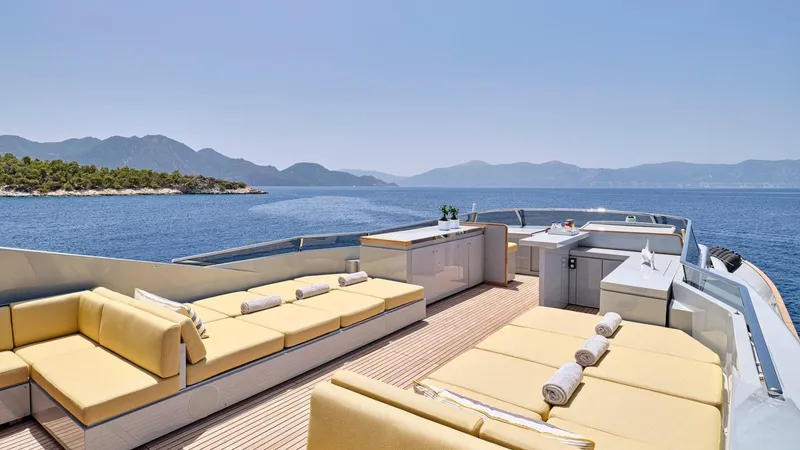 Kintaro Yacht Photos Pics Luxurious 2005 Cantieri di Pisa Akhir 38 yacht deck with scenic ocean view.