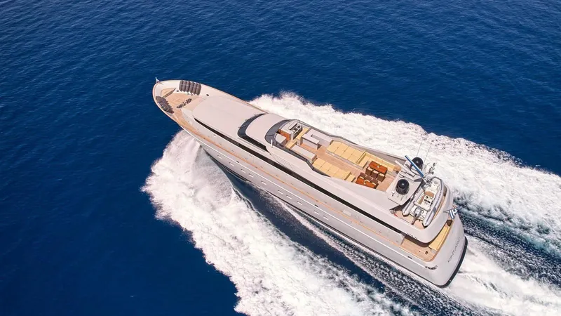 Kintaro Yacht Photos Pics Luxury yacht Cantieri di Pisa Akhir 38 cruising on open sea, 2005 model.