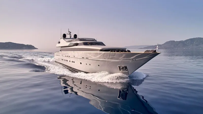 Kintaro Yacht Photos Pics Luxury yacht Cantieri di Pisa Akhir 38, 2005 model, cruising on calm waters.