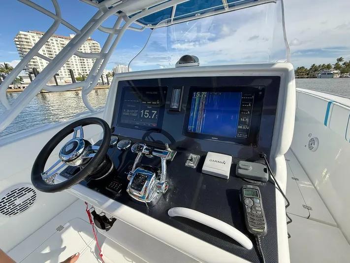  Yacht Photos Pics Control panel of a 2012 Midnight Express 37 Open boat with navigation equipment.