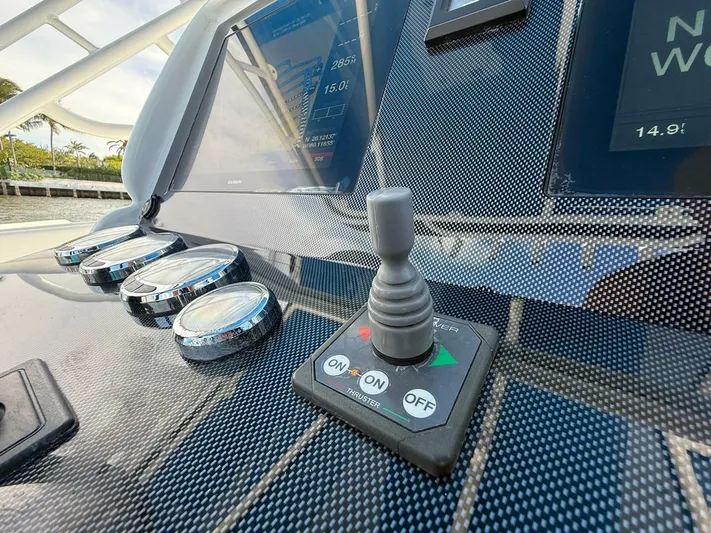  Yacht Photos Pics Control panel of a 2012 Midnight Express 37 Open boat with joystick and gauges.