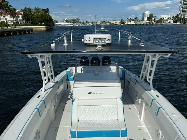  Yacht Photos Pics 2012 Midnight Express 37 Open boat on water, featuring spacious deck and modern design.
