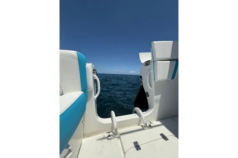  Yacht Photos Pics 2012 Midnight Express 37 Open boat interior with ocean view under clear blue sky.