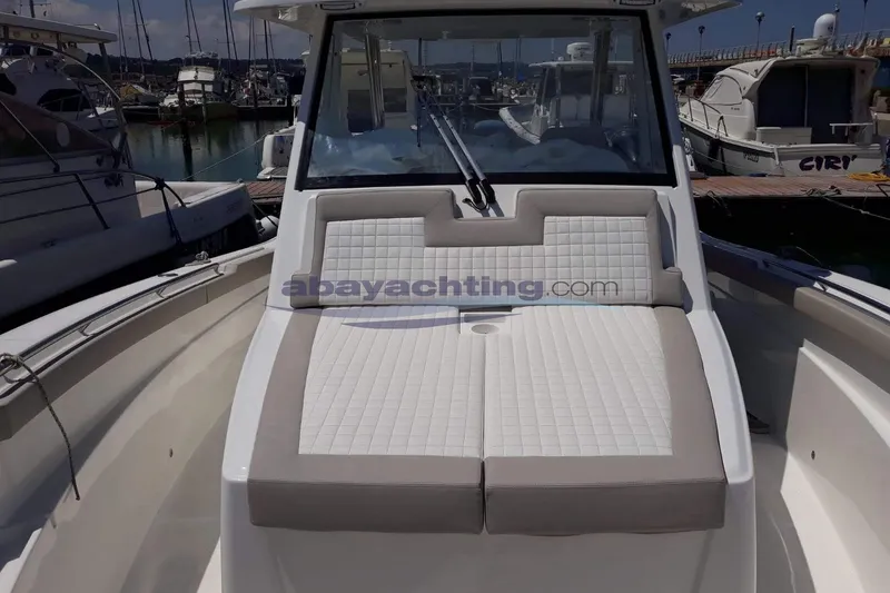  Yacht Photos Pics 2017 3B Craft 330 CC boat with cushioned seating at marina.
