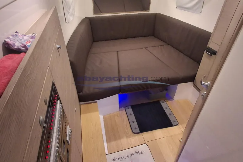  Yacht Photos Pics Interior of 2017 3B Craft 330 CC boat with brown seating and control panel.