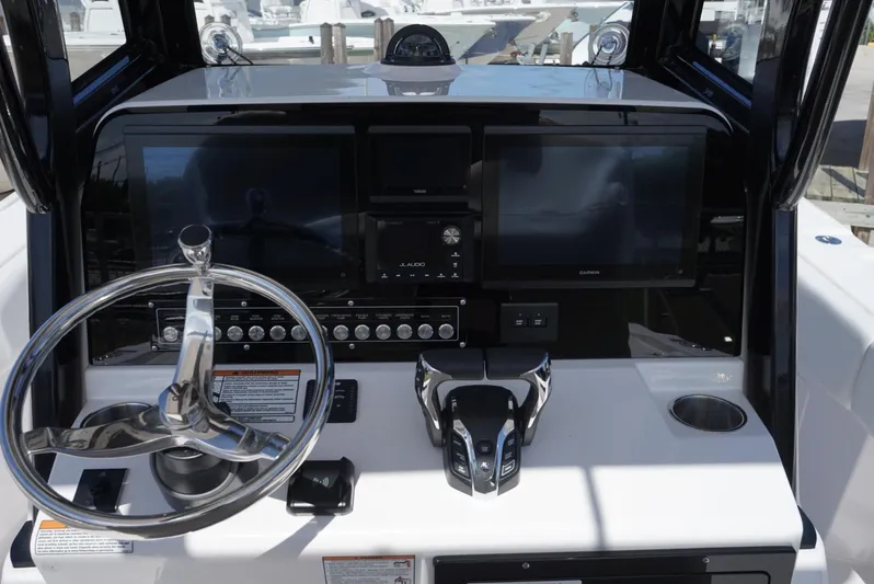  Yacht Photos Pics 2025 Sea Fox 282 Hybrid LT dashboard with steering wheel and advanced navigation displays.
