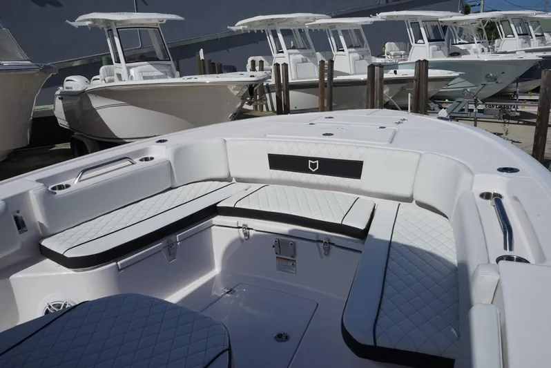  Yacht Photos Pics 2025 Sea Fox 282 Hybrid LT boat interior with white cushioned seating and sleek design.