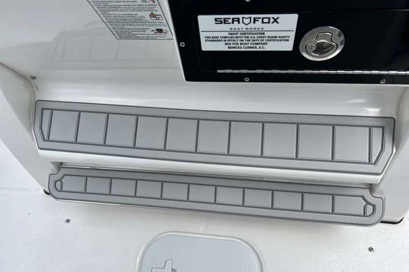  Yacht Photos Pics 2025 Sea Fox 282 Hybrid LT boat deck with non-slip steps and certification label.