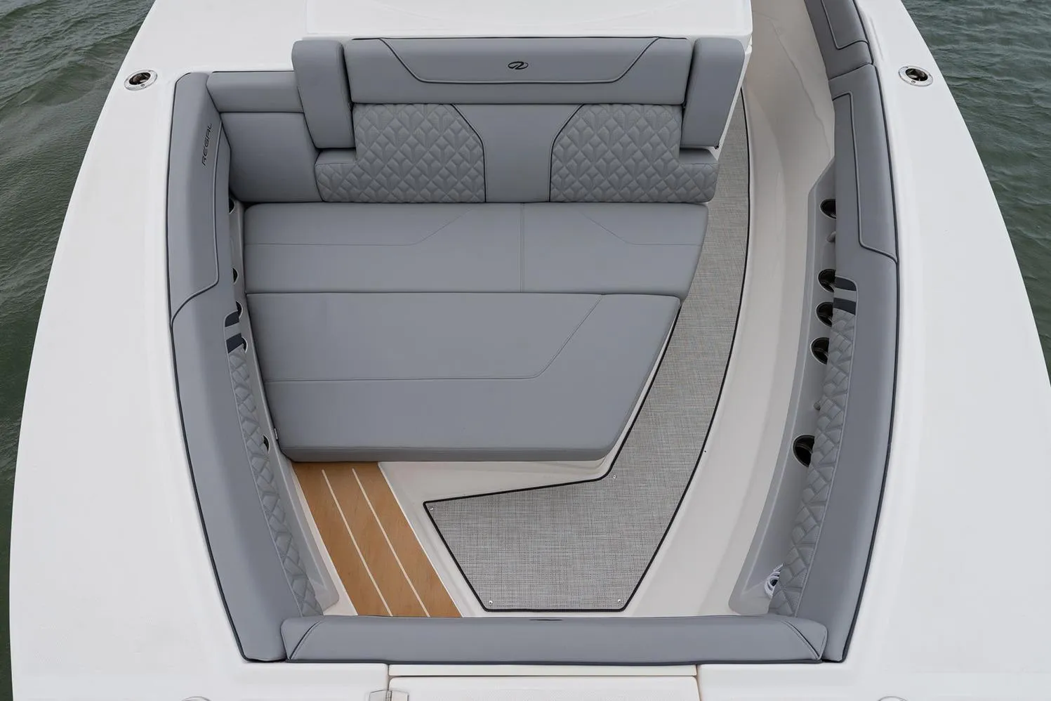 Manufacturer Provided Image: 2026 Regal 34 SAV boat interior with luxurious gray seating and elegant design.